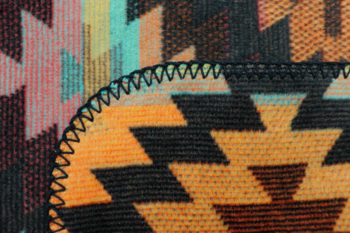 Nomad pledd 150x200, glow